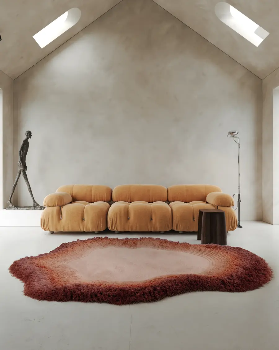 Zolderkamer met boucle sofa en tapijt. Tapijt van Limited Edition.
